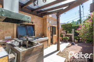 Casa em Condomínio à venda com 275m², 3 dormitórios, 1 suíte, 2 vagas, no bairro Tristeza em Porto Alegre