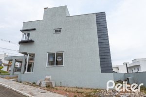 Casa em Condomínio à venda com 225m², 3 dormitórios, 3 suítes, 3 vagas, no bairro Hipica em PORTO ALEGRE