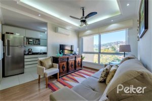 Apartamento à venda com 69m², 2 dormitórios, 1 suíte, 2 vagas, no bairro Tristeza em Porto Alegre