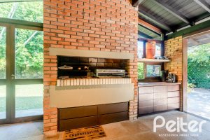 Casa à venda com 187m², 3 dormitórios, 1 suíte, 4 vagas, no bairro Ipanema em Porto Alegre