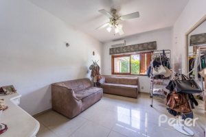 Casa em Condomínio à venda com 400m², 3 dormitórios, 1 suíte, 6 vagas, no bairro Cavalhada em PORTO ALEGRE