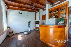 Casa em Condomínio à venda com 400m², 3 dormitórios, 1 suíte, 6 vagas, no bairro Cavalhada em PORTO ALEGRE