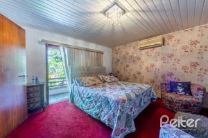 Casa em Condomínio à venda com 400m², 3 dormitórios, 1 suíte, 6 vagas, no bairro Cavalhada em PORTO ALEGRE