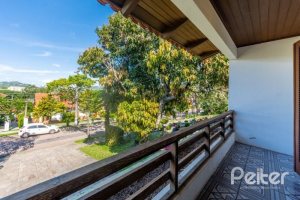 Casa em Condomínio à venda com 400m², 3 dormitórios, 1 suíte, 6 vagas, no bairro Cavalhada em PORTO ALEGRE