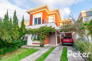 Casa em Condomínio à venda com 220m², 4 dormitórios, 4 suítes, 2 vagas, no bairro Terra Ville em PORTO ALEGRE
