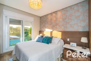 Casa em Condomínio à venda com 220m², 4 dormitórios, 4 suítes, 2 vagas, no bairro Terra Ville em PORTO ALEGRE