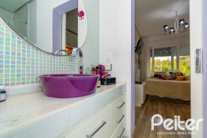 Casa em Condomínio à venda com 220m², 4 dormitórios, 4 suítes, 2 vagas, no bairro Terra Ville em PORTO ALEGRE