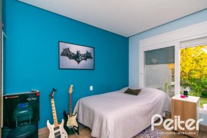 Casa em Condomínio à venda com 220m², 4 dormitórios, 4 suítes, 2 vagas, no bairro Terra Ville em PORTO ALEGRE