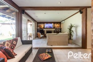 Casa em Condomínio à venda com 400m², 3 dormitórios, 3 suítes, 2 vagas, no bairro Terra Ville em Porto Alegre