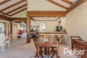 Casa em Condomínio à venda com 400m², 3 dormitórios, 3 suítes, 2 vagas, no bairro Terra Ville em Porto Alegre