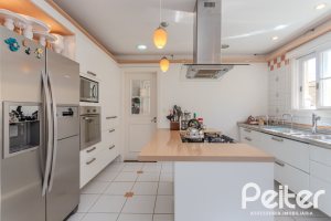 Casa em Condomínio à venda com 400m², 3 dormitórios, 3 suítes, 2 vagas, no bairro Terra Ville em Porto Alegre