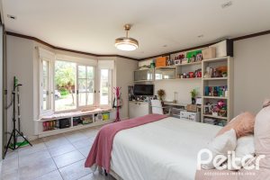 Casa em Condomínio à venda com 400m², 3 dormitórios, 3 suítes, 2 vagas, no bairro Terra Ville em Porto Alegre