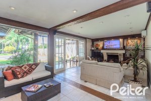 Casa em Condomínio à venda com 400m², 3 dormitórios, 3 suítes, 2 vagas, no bairro Terra Ville em Porto Alegre