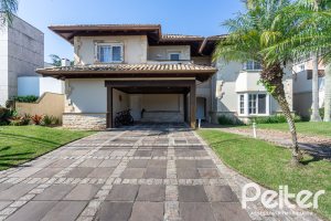 Casa em Condomínio à venda com 400m², 3 dormitórios, 3 suítes, 2 vagas, no bairro Terra Ville em Porto Alegre