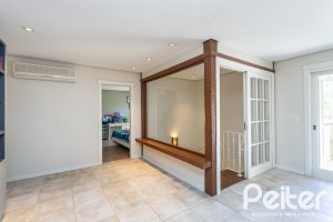 Casa em Condomínio à venda com 400m², 3 dormitórios, 3 suítes, 2 vagas, no bairro Terra Ville em Porto Alegre