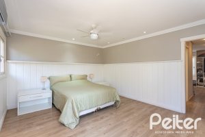 Casa em Condomínio à venda com 400m², 3 dormitórios, 3 suítes, 2 vagas, no bairro Terra Ville em Porto Alegre