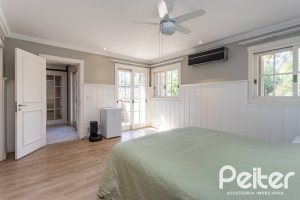 Casa em Condomínio à venda com 400m², 3 dormitórios, 3 suítes, 2 vagas, no bairro Terra Ville em Porto Alegre