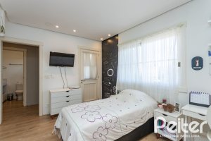 Casa em Condomínio à venda com 400m², 3 dormitórios, 3 suítes, 2 vagas, no bairro Terra Ville em Porto Alegre