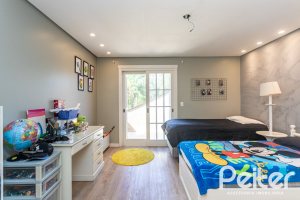 Casa em Condomínio à venda com 400m², 3 dormitórios, 3 suítes, 2 vagas, no bairro Terra Ville em Porto Alegre