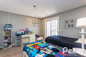 Casa em Condomínio à venda com 400m², 3 dormitórios, 3 suítes, 2 vagas, no bairro Terra Ville em Porto Alegre