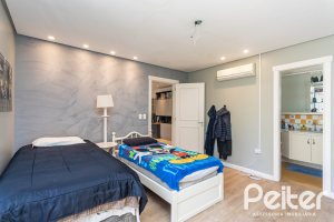 Casa em Condomínio à venda com 400m², 3 dormitórios, 3 suítes, 2 vagas, no bairro Terra Ville em Porto Alegre
