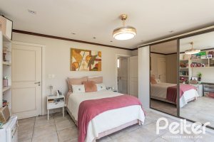 Casa em Condomínio à venda com 400m², 3 dormitórios, 3 suítes, 2 vagas, no bairro Terra Ville em Porto Alegre