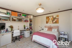 Casa em Condomínio à venda com 400m², 3 dormitórios, 3 suítes, 2 vagas, no bairro Terra Ville em Porto Alegre