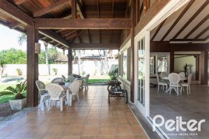 Casa em Condomínio à venda com 400m², 3 dormitórios, 3 suítes, 2 vagas, no bairro Terra Ville em Porto Alegre