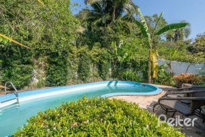 Casa à venda com 460m², 3 dormitórios, 1 suíte, 4 vagas, no bairro Vila Conceição em Porto Alegre