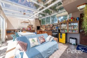 Casa em Condomínio à venda com 283m², 4 dormitórios, 1 suíte, 2 vagas, no bairro Jardim Isabel em Porto Alegre