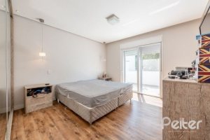 Casa em Condomínio à venda com 283m², 4 dormitórios, 1 suíte, 2 vagas, no bairro Jardim Isabel em Porto Alegre