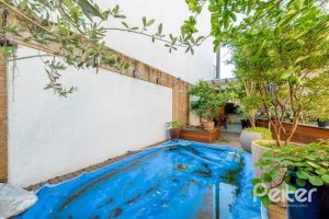 Casa em Condomínio à venda com 283m², 4 dormitórios, 1 suíte, 2 vagas, no bairro Jardim Isabel em Porto Alegre