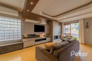 Casa em Condomínio à venda com 201m², 3 dormitórios, 1 suíte, 2 vagas, no bairro Tristeza em Porto Alegre