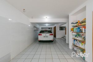 Casa em Condomínio à venda com 201m², 3 dormitórios, 1 suíte, 2 vagas, no bairro Tristeza em Porto Alegre