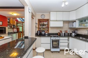 Casa em Condomínio à venda com 208m², 3 dormitórios, 1 suíte, 2 vagas, no bairro Tristeza em PORTO ALEGRE