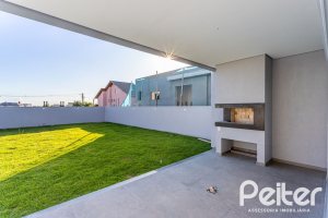 Casa em Condomínio à venda com 293m², 4 dormitórios, 4 suítes, 2 vagas, no bairro Alphaville em PORTO ALEGRE