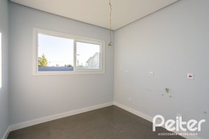 Casa em Condomínio à venda com 293m², 4 dormitórios, 4 suítes, 2 vagas, no bairro Alphaville em PORTO ALEGRE