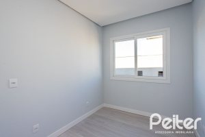 Casa em Condomínio à venda com 293m², 4 dormitórios, 4 suítes, 2 vagas, no bairro Alphaville em PORTO ALEGRE