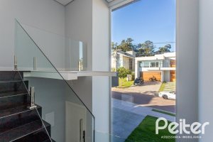 Casa em Condomínio à venda com 293m², 4 dormitórios, 4 suítes, 2 vagas, no bairro Alphaville em PORTO ALEGRE