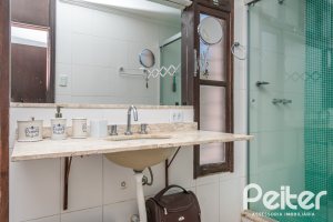 Casa à venda com 266m², 3 dormitórios, 2 suítes, 4 vagas, no bairro Jardim Isabel em Porto Alegre