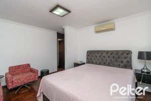 Casa à venda com 266m², 3 dormitórios, 2 suítes, 4 vagas, no bairro Jardim Isabel em Porto Alegre