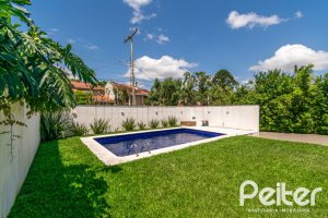 Casa à venda com 266m², 3 dormitórios, 2 suítes, 4 vagas, no bairro Jardim Isabel em Porto Alegre