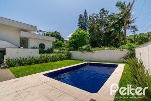 Casa à venda com 266m², 3 dormitórios, 2 suítes, 4 vagas, no bairro Jardim Isabel em Porto Alegre