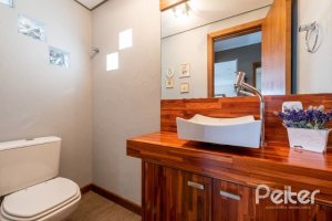 Casa em Condomínio à venda com 219m², 3 dormitórios, 1 suíte, 3 vagas, no bairro Tristeza em Porto Alegre