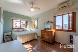 Casa em Condomínio à venda com 219m², 3 dormitórios, 1 suíte, 3 vagas, no bairro Tristeza em Porto Alegre