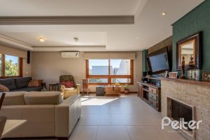 Casa em Condomínio à venda com 219m², 3 dormitórios, 1 suíte, 3 vagas, no bairro Tristeza em Porto Alegre