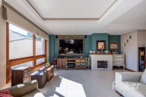 Casa em Condomínio à venda com 219m², 3 dormitórios, 1 suíte, 3 vagas, no bairro Tristeza em Porto Alegre