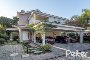 Casa em Condomínio à venda com 568m², 4 dormitórios, 4 suítes, 5 vagas, no bairro Pedra Redonda em PORTO ALEGRE