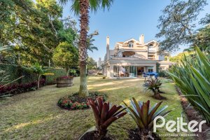 Casa em Condomínio à venda com 568m², 4 dormitórios, 4 suítes, 5 vagas, no bairro Pedra Redonda em PORTO ALEGRE