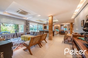 Casa em Condomínio à venda com 568m², 4 dormitórios, 4 suítes, 5 vagas, no bairro Pedra Redonda em PORTO ALEGRE